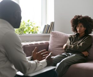 person-sharing-feelings-emotions-therapy-session